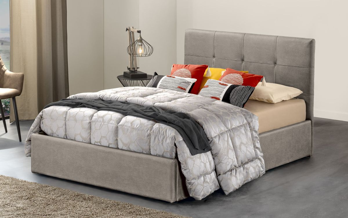 Cama matrimonial con contenedor Una cama de diseño moderno con líneas